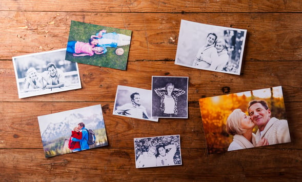 vintage photographs on wooden table
