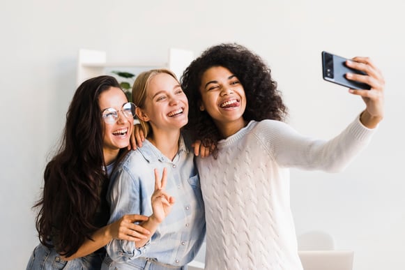smiley-womens-office-taking-selfies